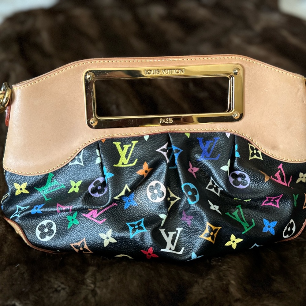 Louis Vuitton Black and Tan Clutch with Monogram Design